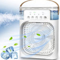 Portable air cooler with fan blades and ice cubes on a blue sky background