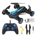 Black and blue drone with remote control, battery, propellers, and USB cable on a white background