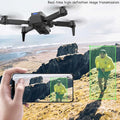 Drone capturing real-time high-definition images of a person on a mountainous landscape.